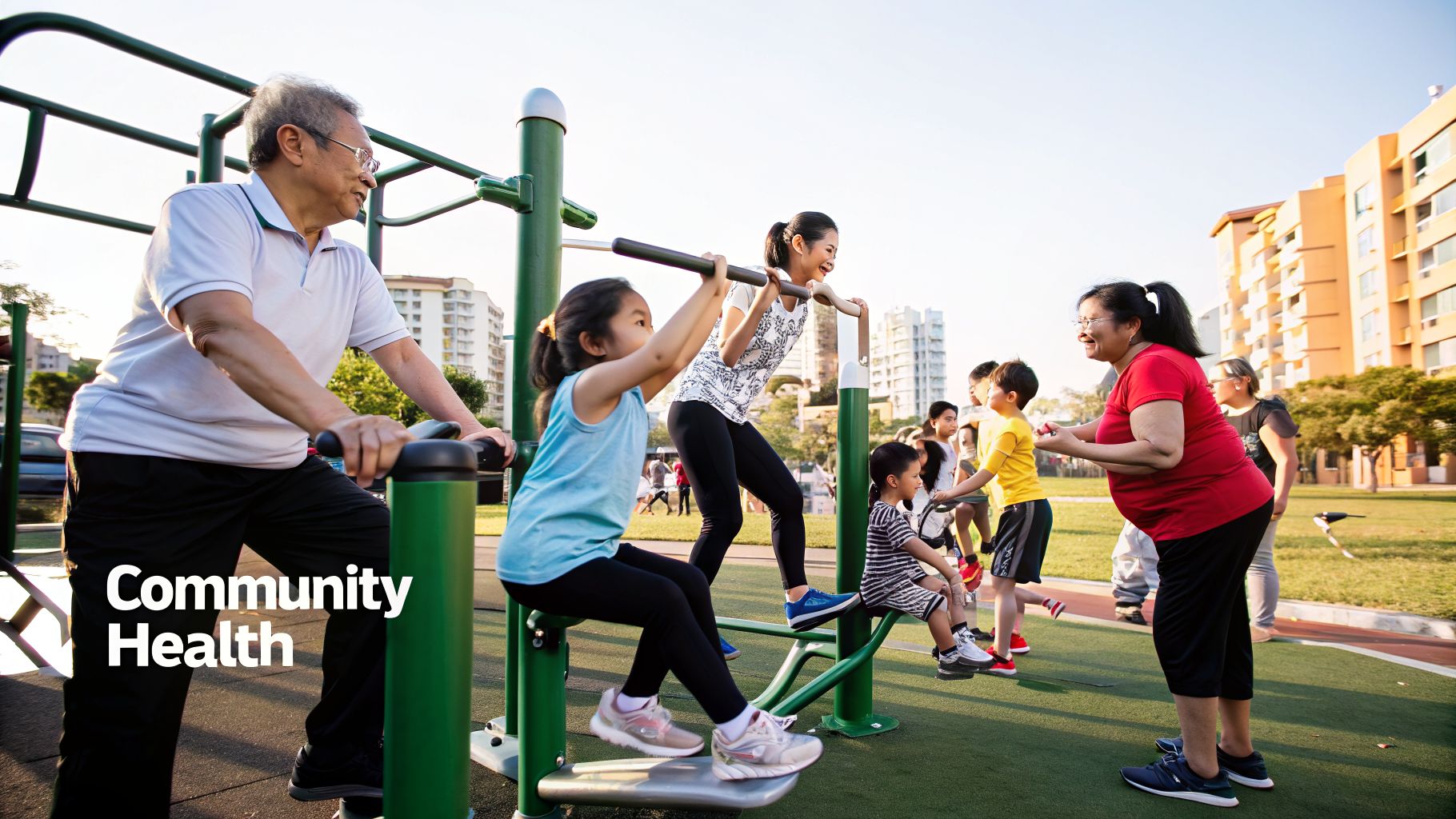 Multigenerational Asian community members smiling and exercising together on outdoor gym equipment in a park.