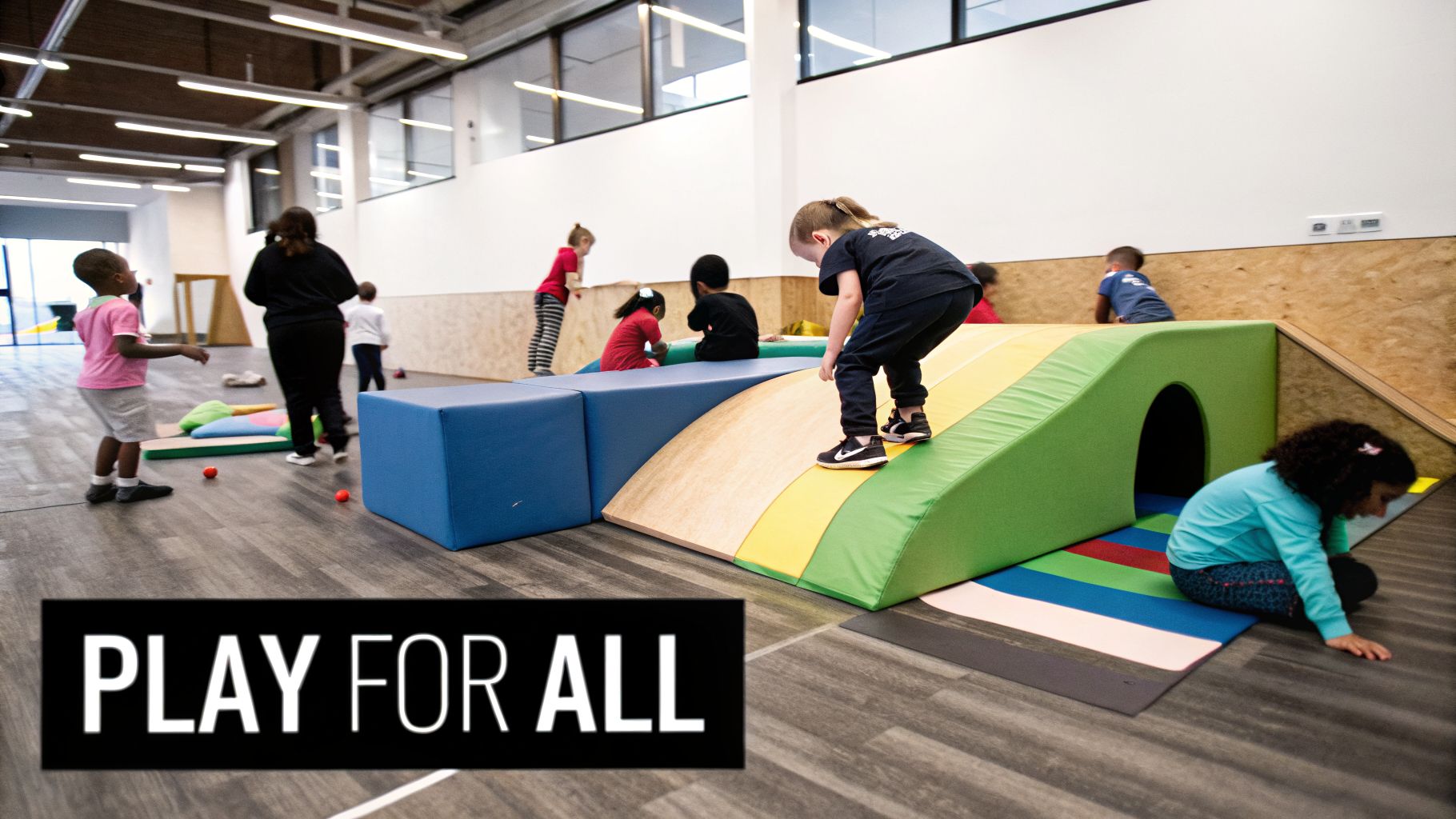 Diverse children and adults play on colorful soft play equipment in a bright indoor area.
